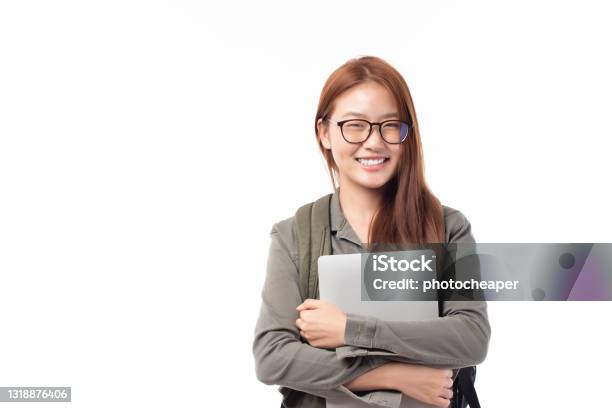 Portrait Of Happy Casual Asian Girl Student With Backpack And Laptop Isolated On White Background Back To School And Learning Concept Stock Photo - Download Image Now