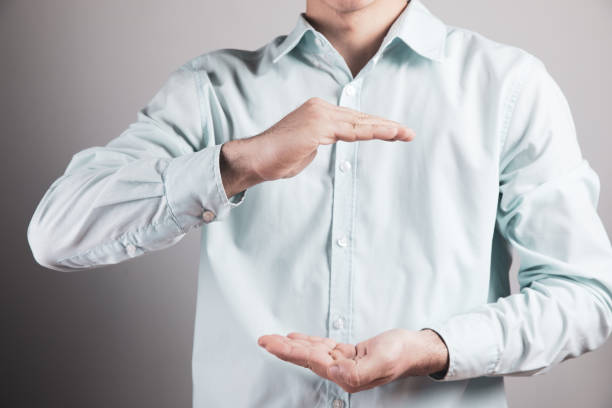 istock man makes a sign of protection with his hands 1318876682