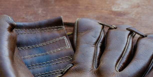 istock old baseball glove close up 1318877720