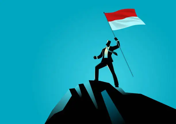 Vector illustration of Businessman holding the flag of Indonesia on top of the mountain