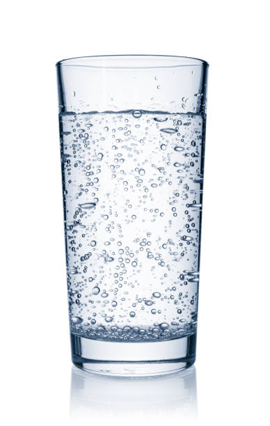 istock Glass with sparkling water  isolated on white background 1318880445