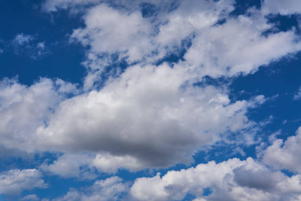 istock Grey cumulus clouds on the blue sky 1318883761