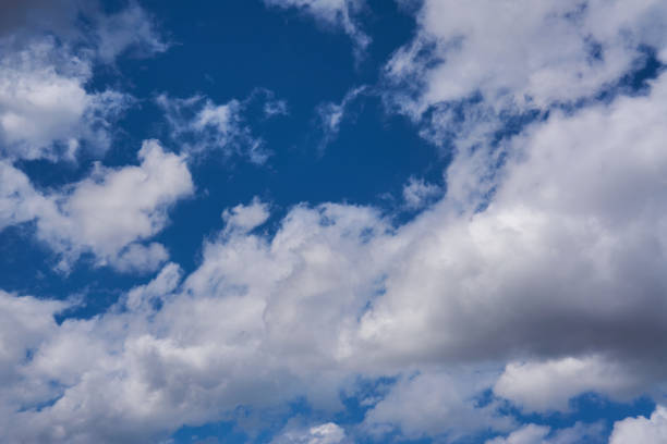istock Cumulus clouds on the blue sky 1318883766