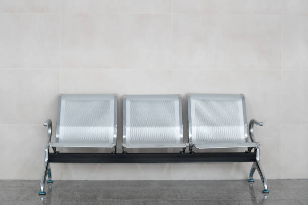 istock Empty metal benches in waiting room 1318884188