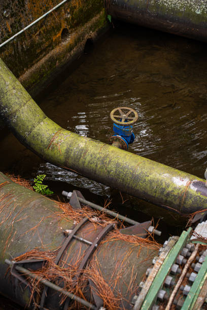 istock Large metallic pipes - connection and shutoff valve 1318884931