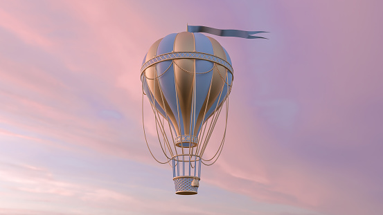 Colorful hot air balloon flying above the clouds