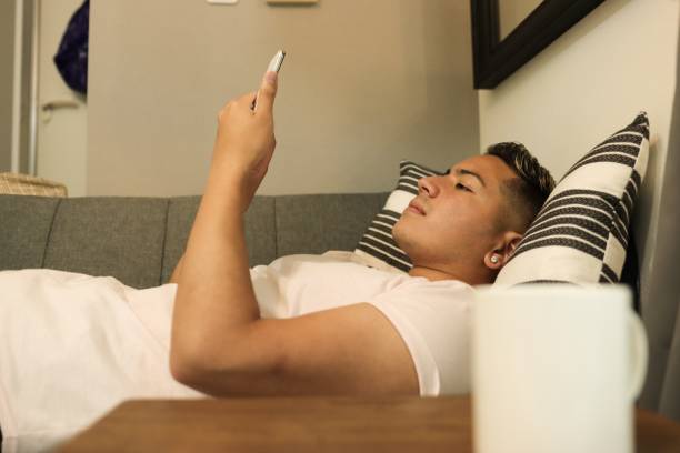 istock Portrait of young man talking by online 1318894766