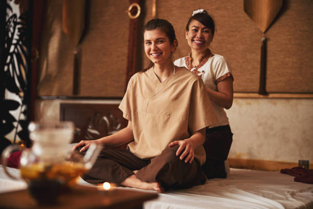 istock Thai massagist and her patient smiling to camera 1318897164