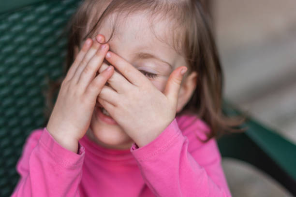 istock Girl covering her face whit hands 1318897308