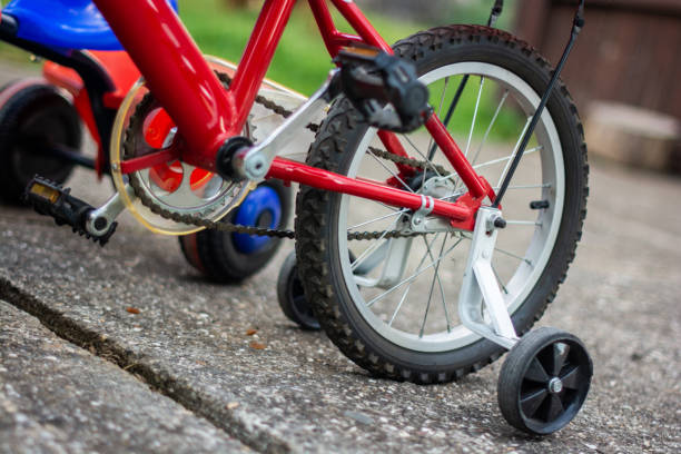 istock Child's bike with training wheels 1318900827