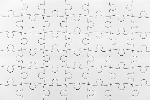 White jigsaw puzzle pattern isolated