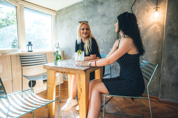 istock Two young women in cafe 1318915206
