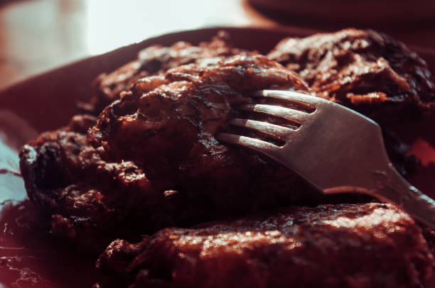 istock Fried vegetable fritters with zucchini, carrots, herbs, eggs, and cheese. 1318915421