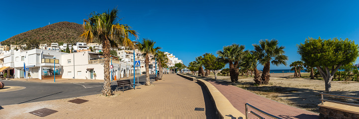 Panoramic view of the promenade next to San Jose beach in the town of Nijar, Almería. Andalusian coast in Cabo de Gata. Spain