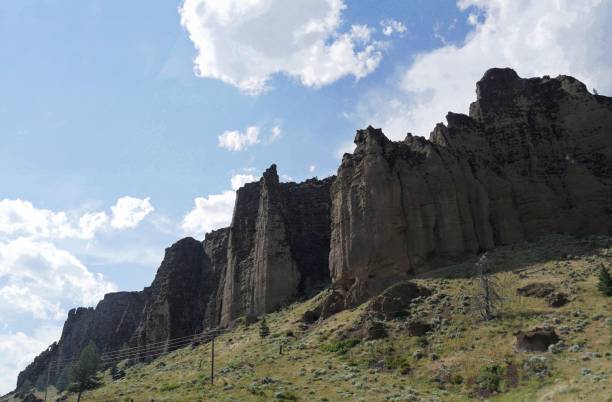 istock Impressive rock formations and buttes along North Fork Road, Wyoming. 1318927021