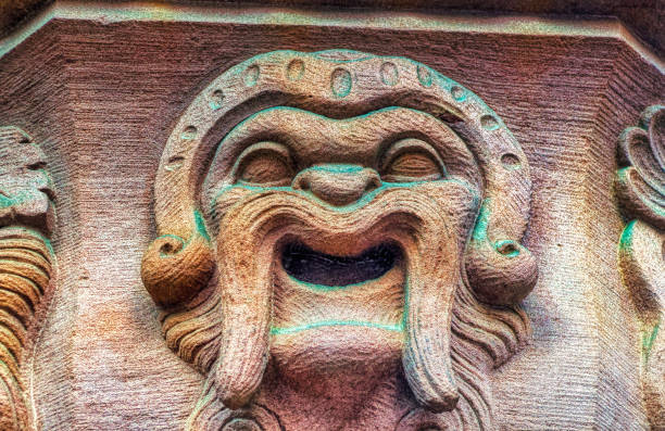 istock Bas relief decorative sculpture on facade of public building. 1318927924