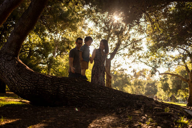 istock Young Diverse Family Walking in the park 1318928315