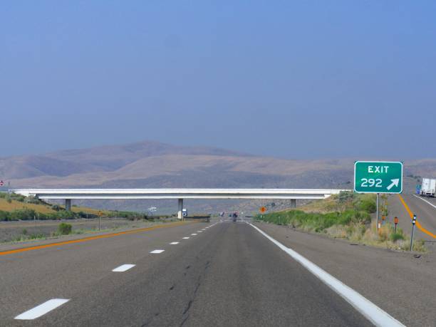 istock Intersecting road over Interstate 80 with directions to Exit 292 in Elko County, Nevada. 1318929155