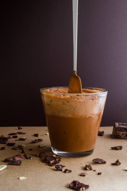 istock Giant chocolate mousse pot, milk , black chocolate mousse on a big glass pot, 1318932209