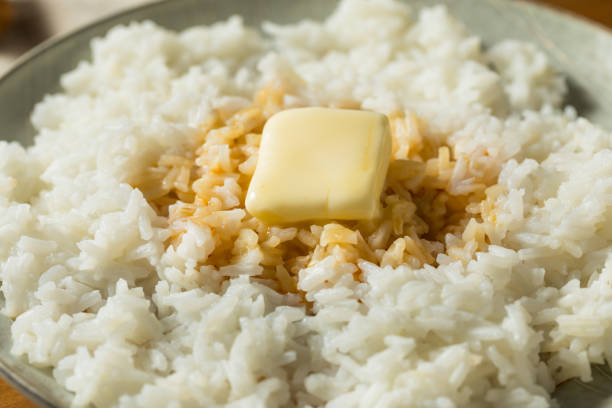 Homemade Japanese Butter Rice Homemade Japanese Butter Rice with Soy Sauce jasmine rice stock pictures, royalty-free photos & images