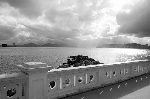 View of the city of Santos with its famous wall that became a symbol of the city, photographed in black and white.
