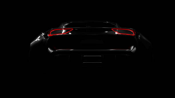 istock sportscar silhouette on black background 1318948062
