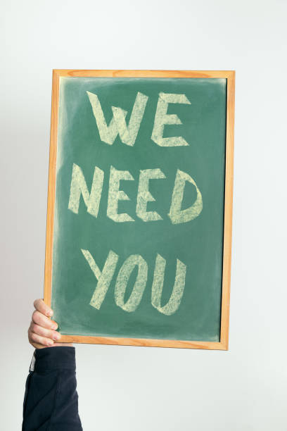 istock chalkboard with WE NEED YOU handwritten in chalk 1318948210