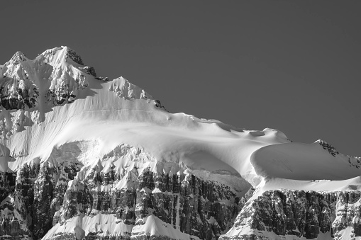 A wide-angle of Athabasca Glacier during the Spring season. The image is black and white.