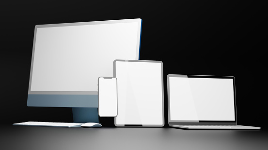 Computer devices with tablet, computer, laptop and smartphone with mock-up screen isolated on black background, 3D rendering, 3D illustration