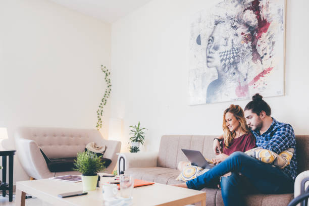 istock Diverse Couple using a laptop for online shopping 1318965208