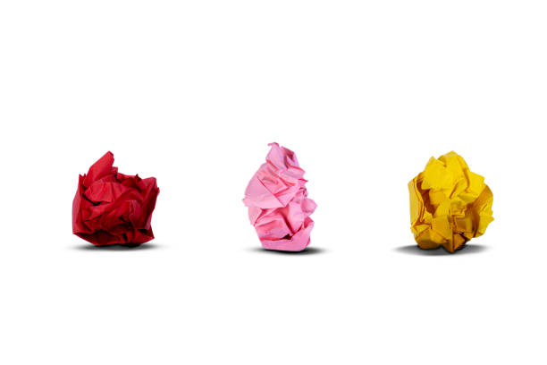 istock Colorful crumpled paper balls on white background 1318972860