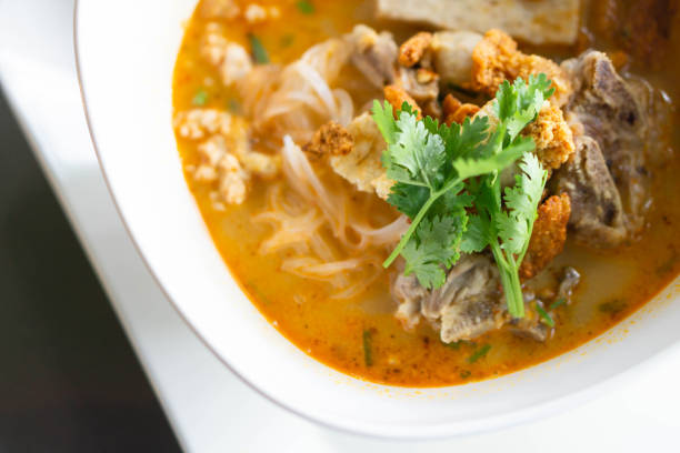 istock Rice noodle soup with Cooked Liver in  bowl on table, selective focus 1318973591
