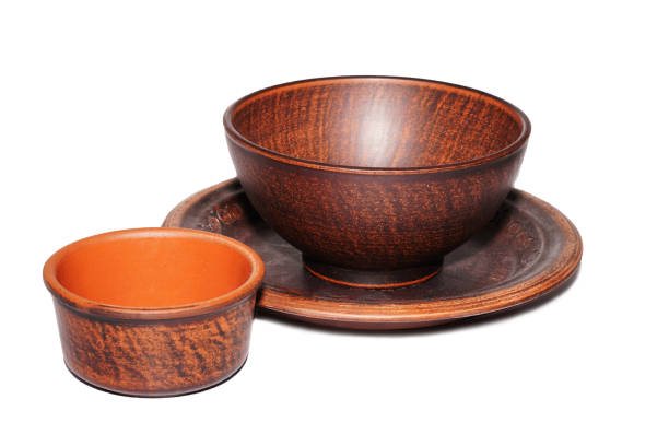 istock Round Deep clay bowls and plate isolated on white background. 1318973722