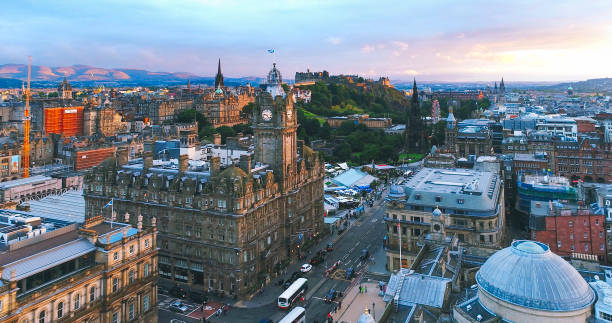 Aerial view of Edinburgh city during sunset Scotland Aerial view of Edinburgh city during sunset Scotland clock tower photos stock pictures, royalty-free photos & images