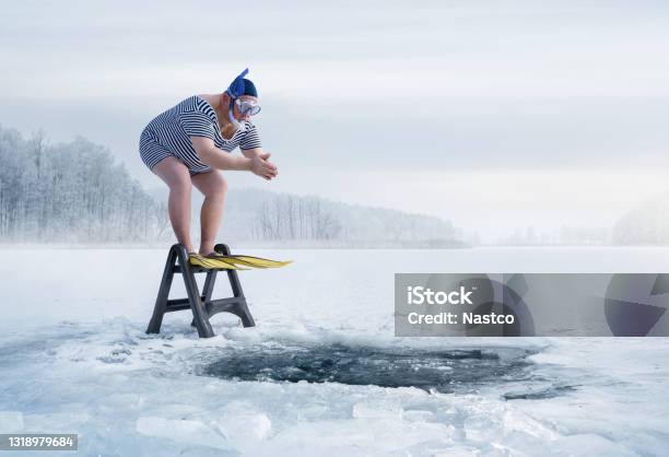 Fuunny Overweight Retro Swimmer About To Jump Into The Ice Hole Stock Photo - Download Image Now