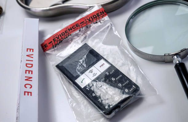 smartphone involved in lab murder, concept image stock photo