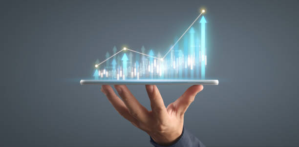 istock Plan graph growth increase of chart positive indicators in his business on tablet 1318980885