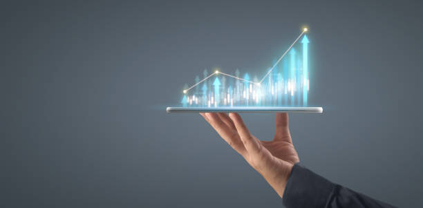 istock Plan graph growth increase of chart positive indicators in his business on tablet 1318980891