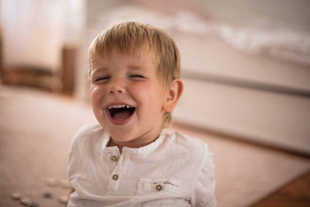 Smiling little boy at home.