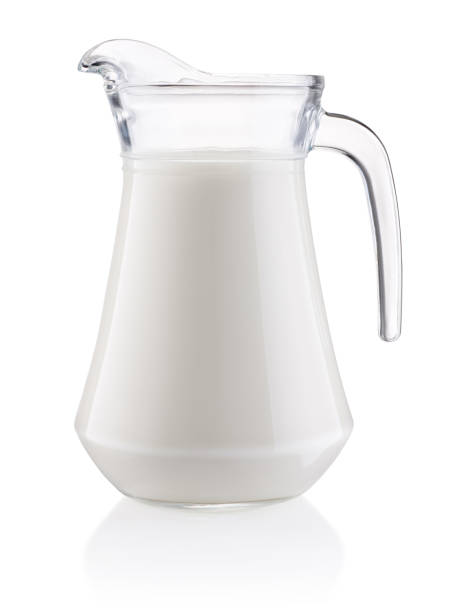 istock Jug of milk isolated on white background 1318984502