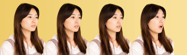 istock Evolution of emotions. Asian young woman's portrait on yellow studio background. Concept of human emotions, facial expression, youth, sales, ad. 1318984788