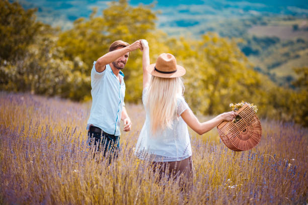 istock Young Couple in lavender field. 1318986191