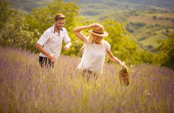 istock Young Couple in lavender field. 1318986471