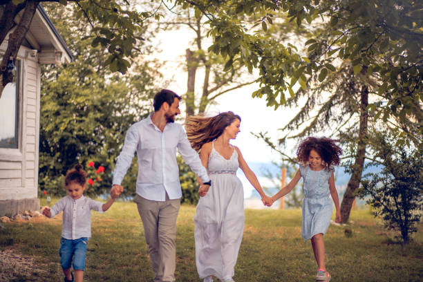 istock Happy family in backyard. 1318987263
