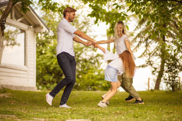 istock Happy family in backyard. 1318987391