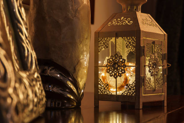 istock lantern with christmas flashing lights decorating a room 1318988799