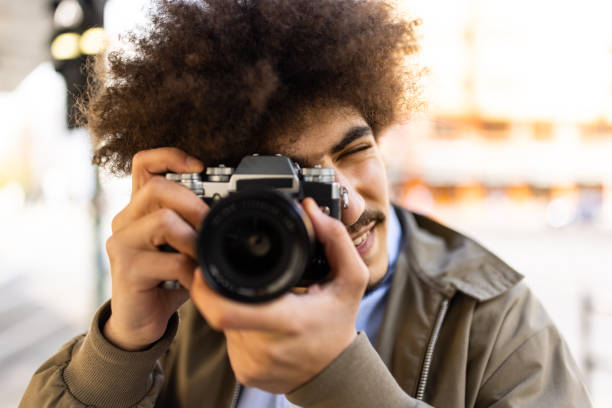 istock Tourist taking photos  while touring a foreign city 1318992624
