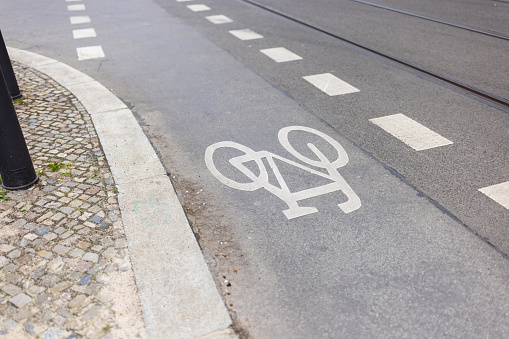 Empty cycle track with bike lane sign. Sign for bicycle painted on the asphalt.
