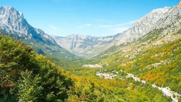 Beautiful views of the valley and the surrounding mountains. Theth National Park, Albania. The theme is nature, travel, exploring, Europe, Albania, Balkan, national parks, tourism, hiking, trekking.