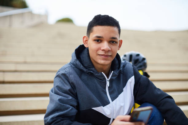 istock A young delivery person looking at the camera. 1318996577
